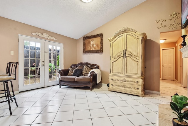 2704 Game Lake Dr, Irving, TX 75060 - sitting room featuring lofted ceiling, light tile patterned flooring, baseboards, a textured ceiling, and french doors