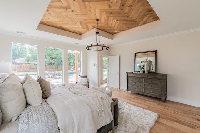 300 Preakness Cir, Southlake, TX 76092 - bedroom with a raised ceiling, a chandelier, baseboards, light wood-style flooring, and access to outside
