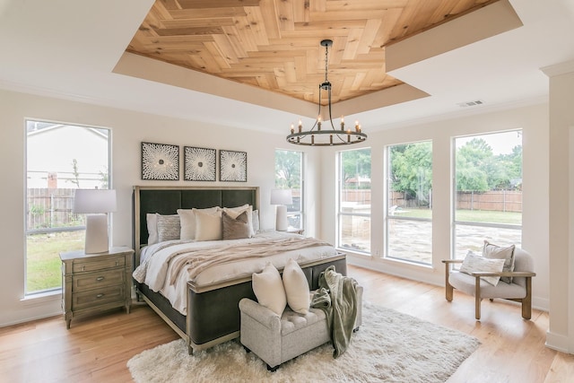 300 Preakness Cir, Southlake, TX 76092 - bedroom featuring a raised ceiling, multiple windows, a chandelier, light wood-style floors, and wooden ceiling