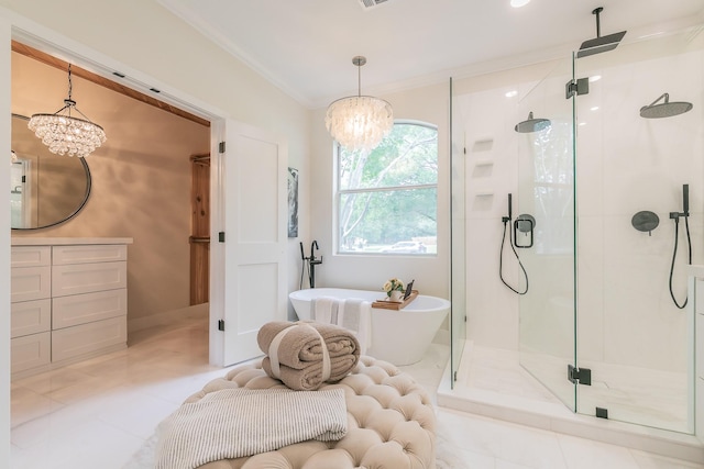 300 Preakness Cir, Southlake, TX 76092 - full bath featuring a chandelier, a shower stall, a soaking tub, vanity, and tile patterned flooring