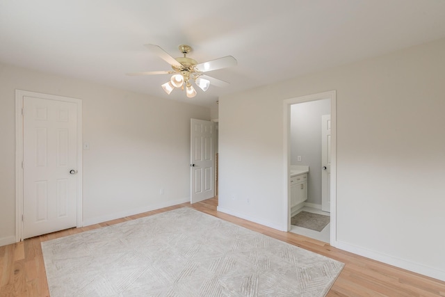 300 Preakness Cir, Southlake, TX 76092 - unfurnished bedroom featuring light wood-style floors, baseboards, ensuite bathroom, and a ceiling fan