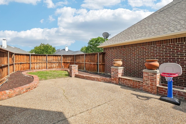 view of patio with a fenced backyard
