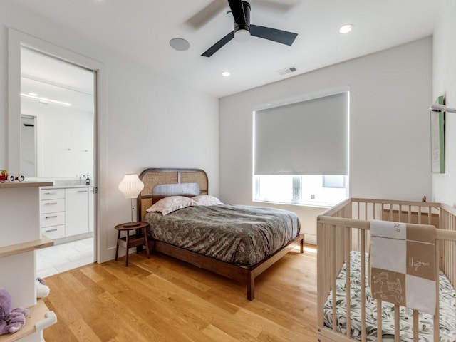 bedroom with a ceiling fan, recessed lighting, light wood-style flooring, and visible vents