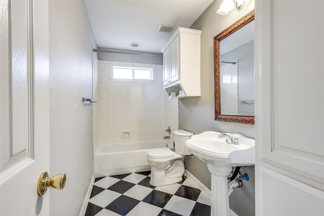 bathroom with visible vents, toilet, baseboards, shower / bathing tub combination, and tile patterned floors