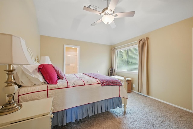 bedroom with light colored carpet, connected bathroom, baseboards, and a ceiling fan