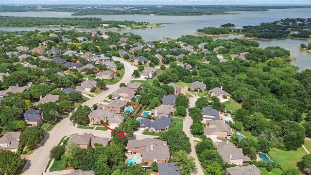 aerial view featuring a water view and a residential view