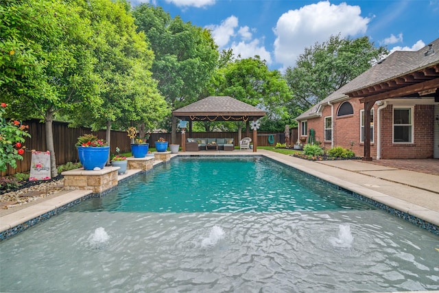 view of pool with a gazebo, a fenced in pool, an outdoor hangout area, a fenced backyard, and a patio