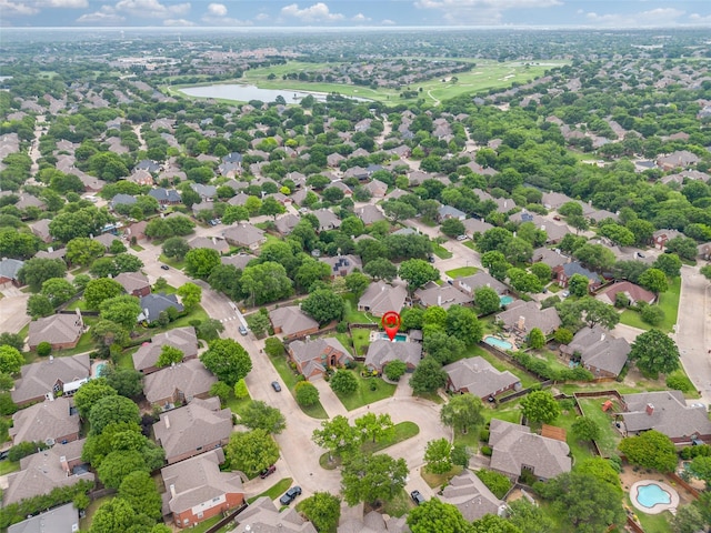 aerial view with a residential view and a water view