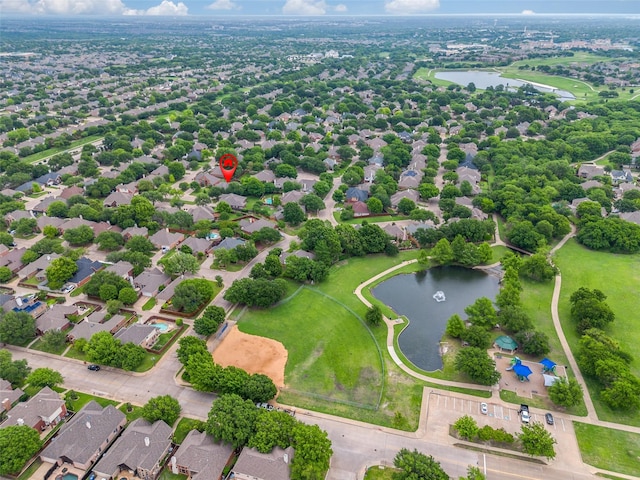 aerial view featuring a water view and a residential view