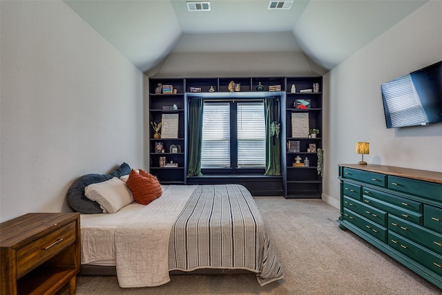 carpeted bedroom featuring visible vents and lofted ceiling