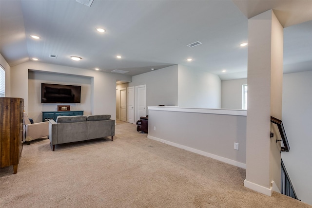 living room with baseboards, light carpet, recessed lighting, and visible vents