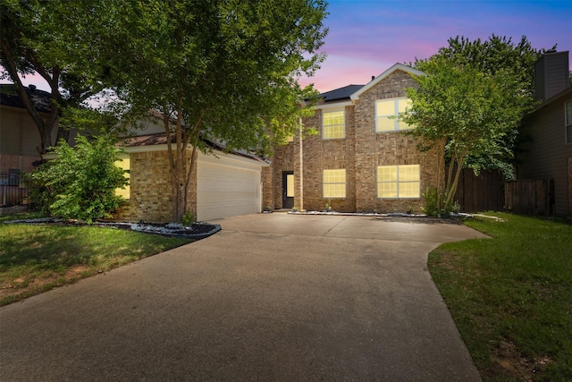 2624 Misty Glen Dr, Flower Mound, TX 75028 - view of front of property featuring concrete driveway, roof mounted solar panels, brick siding, and a garage