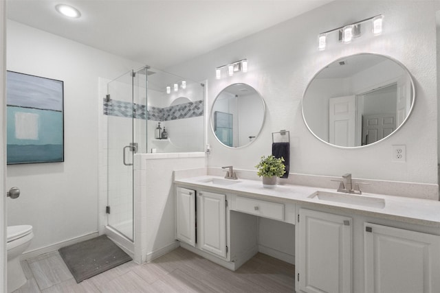 2624 Misty Glen Dr, Flower Mound, TX 75028 - full bath with double vanity, a stall shower, toilet, and baseboards