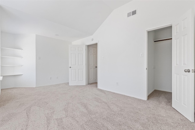 2624 Misty Glen Dr, Flower Mound, TX 75028 - unfurnished bedroom featuring a walk in closet, vaulted ceiling, carpet floors, baseboards, and a closet
