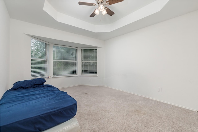 2624 Misty Glen Dr, Flower Mound, TX 75028 - bedroom featuring carpet flooring, a raised ceiling, baseboards, and ceiling fan