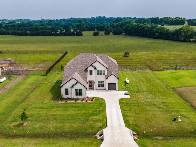 birds eye view of property featuring a rural view