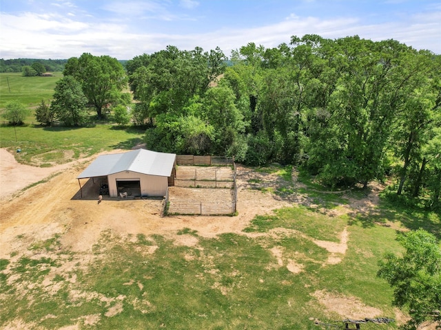 birds eye view of property featuring a rural view