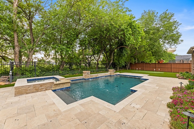 view of pool featuring a pool with connected hot tub, a fenced backyard, and a patio area