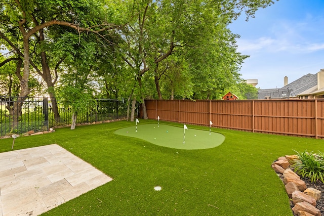 view of yard featuring a fenced backyard and a patio area