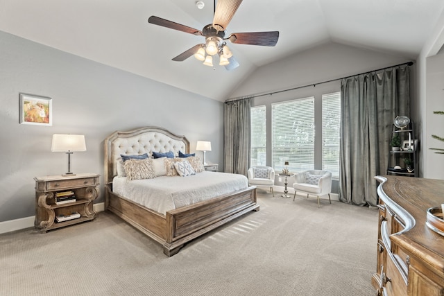bedroom with baseboards, a ceiling fan, vaulted ceiling, and light carpet