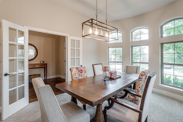 11948 Carlin Dr, Fort Worth, TX 76108 - dining space with baseboards, a healthy amount of sunlight, and french doors