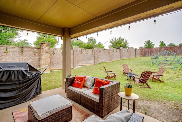 11948 Carlin Dr, Fort Worth, TX 76108 - view of patio featuring a fenced backyard, an outdoor living space with a fire pit, and area for grilling
