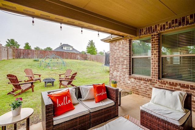11948 Carlin Dr, Fort Worth, TX 76108 - view of patio / terrace featuring a fenced backyard and an outdoor living space with a fire pit