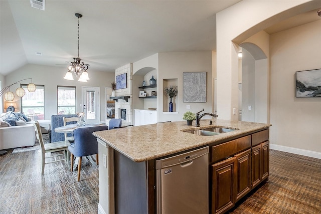 11948 Carlin Dr, Fort Worth, TX 76108 - kitchen with stainless steel dishwasher, visible vents, open floor plan, an island with sink, and a sink