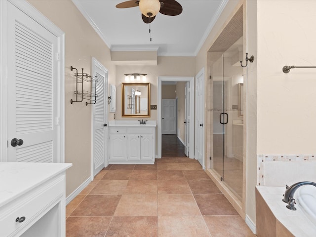 6916 April Way Cir, Plano, TX 75023 - full bath featuring vanity, crown molding, tiled tub, a shower stall, and a ceiling fan
