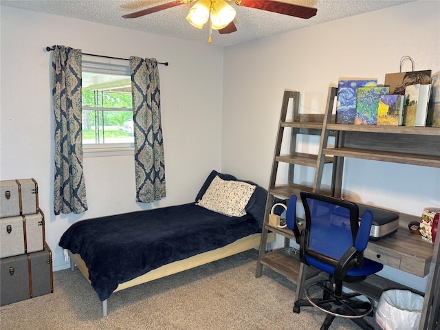 1207 W Cage St, Stephenville, TX 76401 - bedroom with carpet floors, a textured ceiling, and ceiling fan