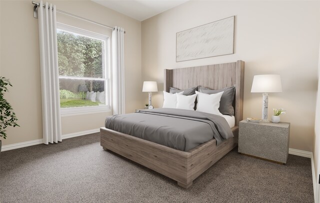 bedroom with baseboards and carpet