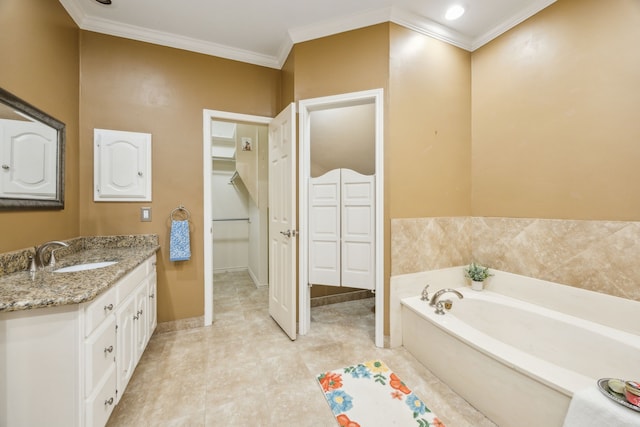 full bath featuring crown molding, vanity, and a bath
