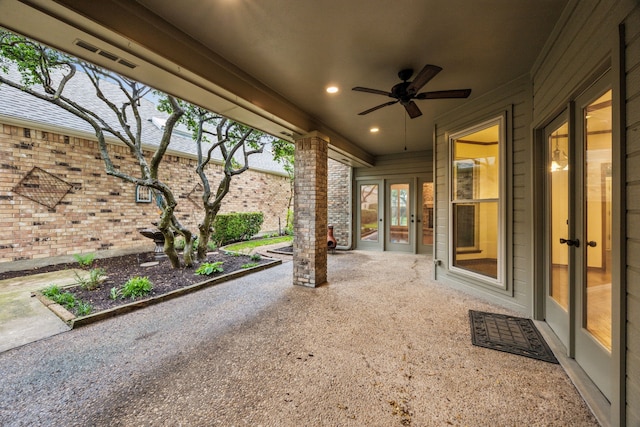 view of patio / terrace with ceiling fan, french doors, and visible vents