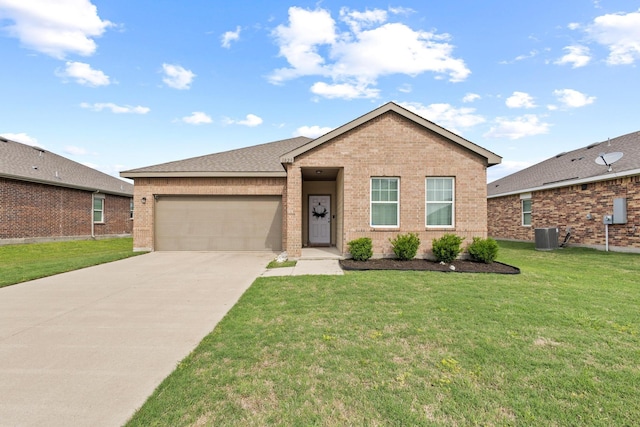 1823 Wolf Run, Anna, TX 75409 - ranch-style house featuring concrete driveway, brick siding, an attached garage, and a front lawn