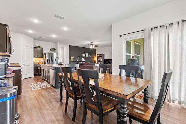 1823 Wolf Run, Anna, TX 75409 - dining space with recessed lighting, ceiling fan, visible vents, and light wood finished floors