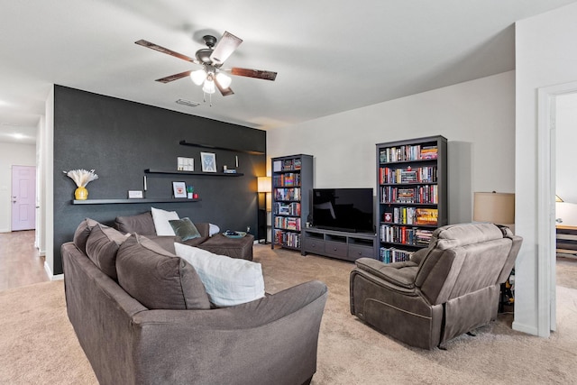 1823 Wolf Run, Anna, TX 75409 - carpeted living area with ceiling fan and visible vents
