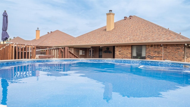 view of pool featuring a fenced in pool