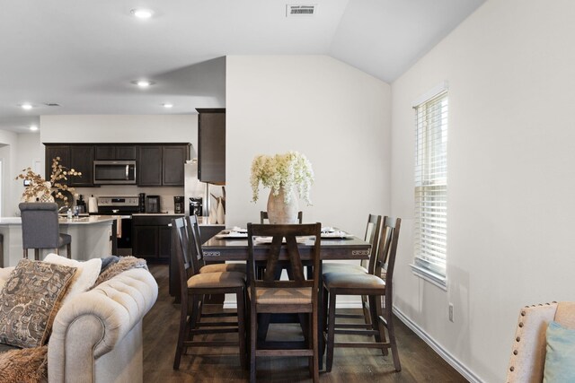 3033 Zinnia St, Royse City, TX 75189 - dining room with dark wood-style floors, baseboards, recessed lighting, and lofted ceiling