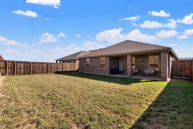3033 Zinnia St, Royse City, TX 75189 - back of property with brick siding and a patio area