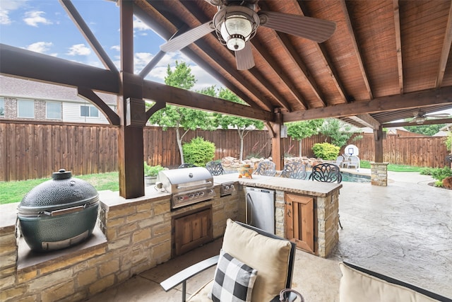 view of patio with a fenced backyard, a ceiling fan, grilling area, and area for grilling