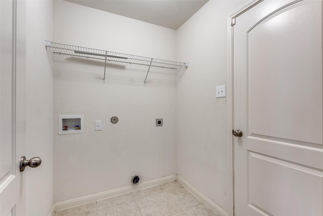 laundry room featuring laundry area, baseboards, washer hookup, and electric dryer hookup