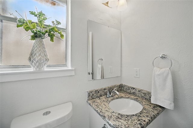 528 Chambers St, Denton, TX 76205 - half bath featuring toilet and a sink