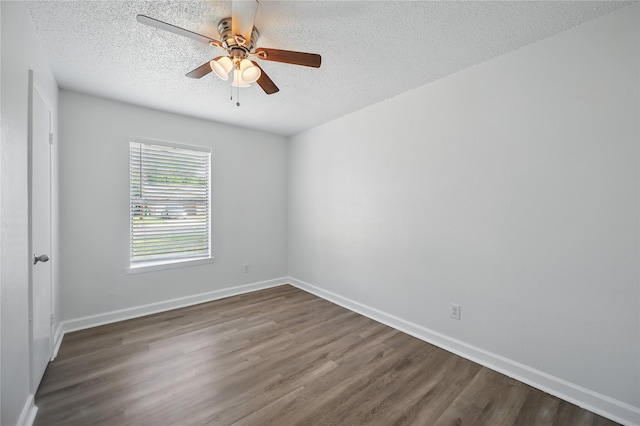 528 Chambers St, Denton, TX 76205 - unfurnished room with baseboards, a textured ceiling, dark wood-style floors, and ceiling fan