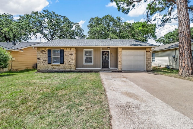 528 Chambers St, Denton, TX 76205 - ranch-style home featuring concrete driveway, brick siding, a front lawn, and a garage