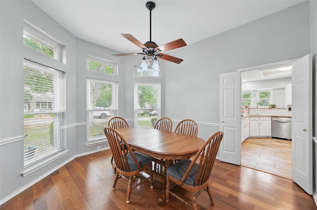 818 Red Oak Dr, Mansfield, TX 76063 - dining area with wood finished floors, plenty of natural light, and ceiling fan