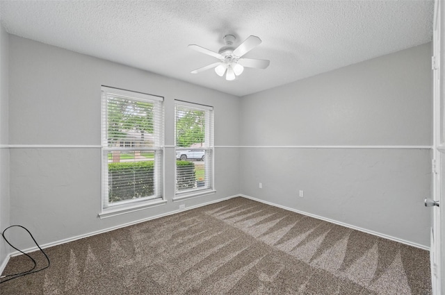 818 Red Oak Dr, Mansfield, TX 76063 - carpeted spare room featuring a textured ceiling, a ceiling fan, and baseboards