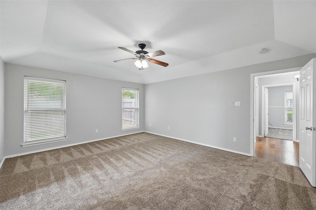 818 Red Oak Dr, Mansfield, TX 76063 - unfurnished room with carpet floors, ceiling fan, baseboards, a smoke detector, and a raised ceiling