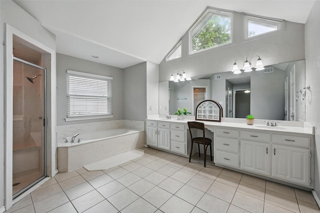 818 Red Oak Dr, Mansfield, TX 76063 - bathroom with double vanity, a bath, a stall shower, tile patterned floors, and healthy amount of natural light