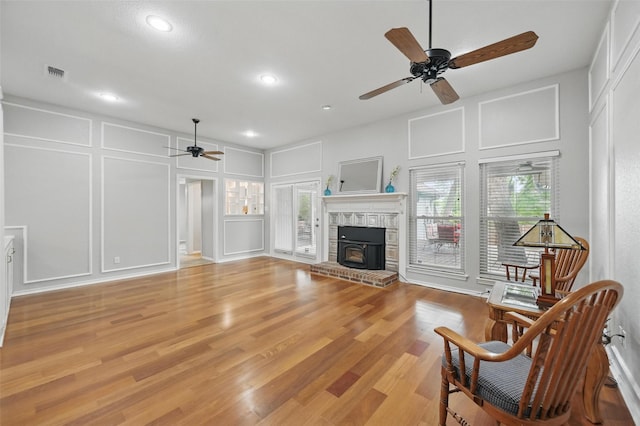 818 Red Oak Dr, Mansfield, TX 76063 - living area with a decorative wall, a ceiling fan, recessed lighting, and light wood finished floors