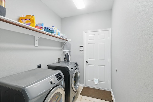 8208 Rock Elm Rd, Fort Worth, TX 76131 - washroom featuring washer and clothes dryer, light tile patterned floors, and baseboards
